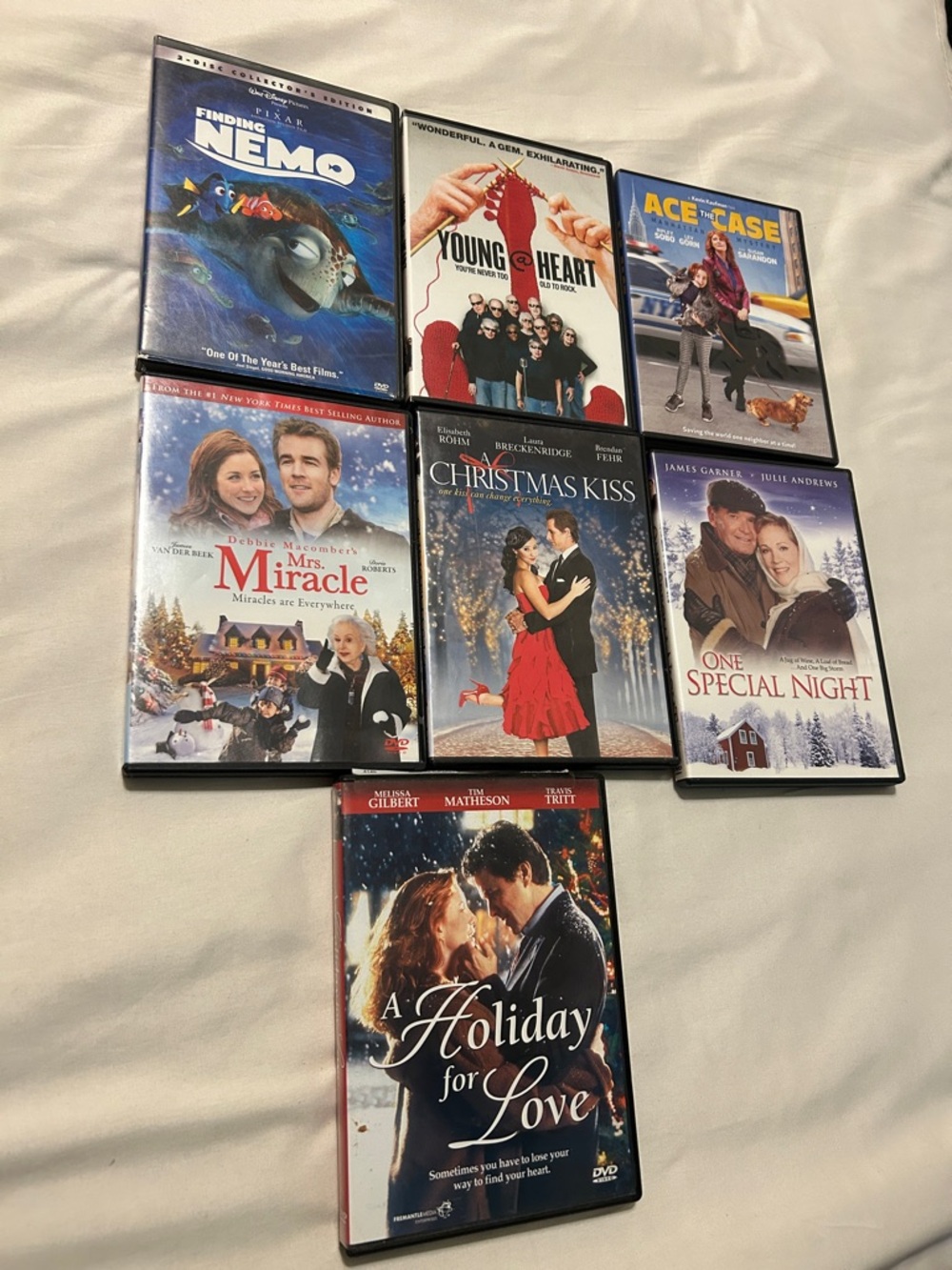 Dvd lot Christmas , ace the case, young @ heart